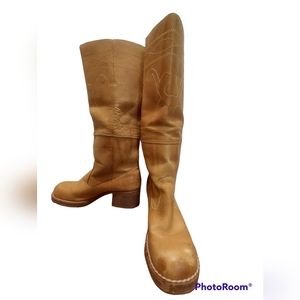 Chunky calf high boots in a cognac leather.